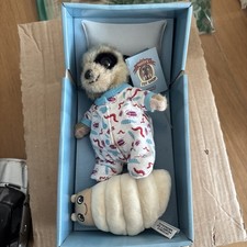 Compare The Meerkats Oleg Meerkat Soft Toy And Teddy In Crib