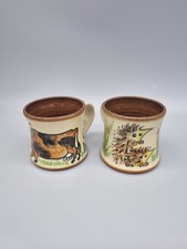 A Pair Of Studio Pottery Small Mugs By Godshill Pottery, Hedgehog and Cow.