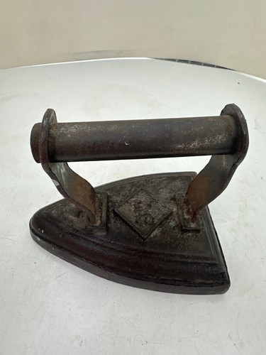 Antique cast iron sad - cast,
