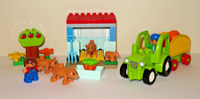Duplo green tractor with trailer, pig sty, 5 pigs, 2 figures and accessories