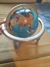 large world globe gold and