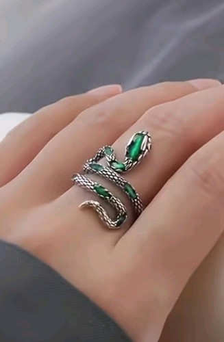 Silver tone green coiled - tone,