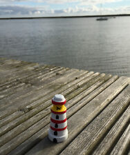 mini painted wooden lighthouse