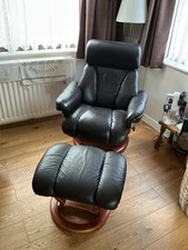 leather swivel recliner chair and footstool