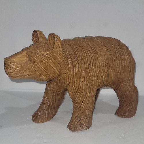 Hand carved wooden bear - hand,
