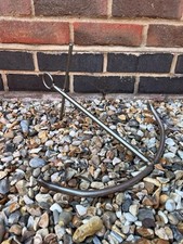 A Stainless Steel Decorative Sculpture Of An Sailing Admiralty Anchor