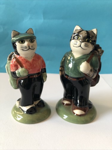 Male female cat golfers - &,