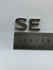 Saab 9-5 9-3 ‘SE’ Wing Badge Logo Emblem Silver Plastic Letters