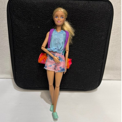 Barbie takes two malibu - it,