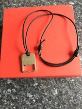 ORIGINAL MEN'S D&G BOTTLE OPENER DOG TAG. LEATHER STRAPS. GREAT CONDITION.