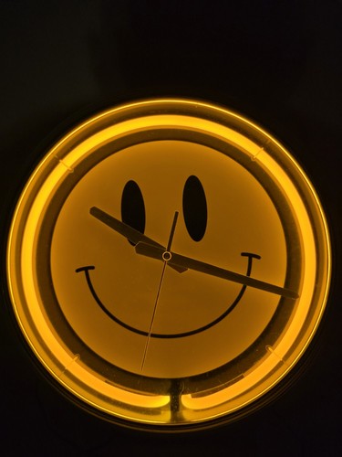 Smiley face yellow neon wall - face,