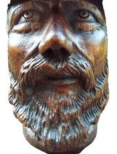 A WELL CARVED OAK  BUST STATUE