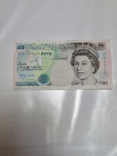 Five pound note bank of - five,