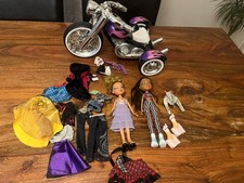 2 X Collectible Bratz Dolls, Clothes And Tricycle