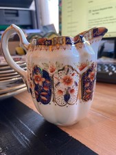 Antique Court China milk jug, Imari Colours.