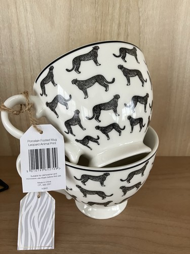 Pair new porcelain footed - of,
