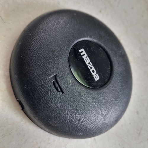 Mazda steering wheel centre - mazda,