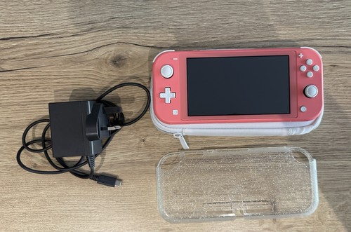 Nintendo switch lite coral - nintendo,