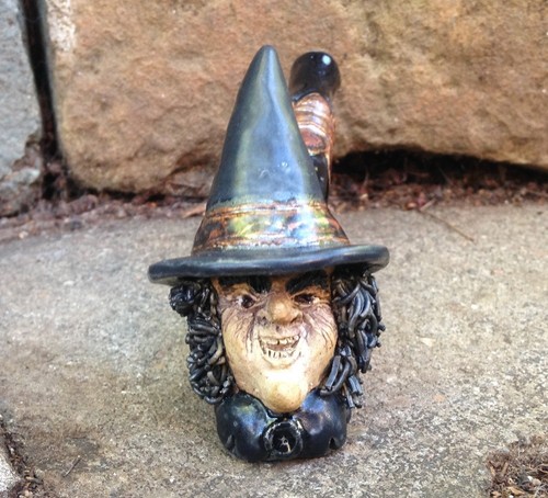 Old witch smoking pipe - old,