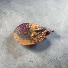 hand-carved and hand-painted