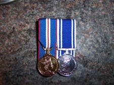 2 MINIATURE MEDALS COURT