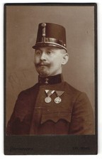 Photograph Sig. Bing, Vienna, K.u.K. Officer in uniform with medal and shako, 1 