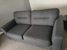 charcoal grey three seater