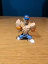 Orange wristbands WWF/WWE John Cena Rumblers wrestling figure, combined postage