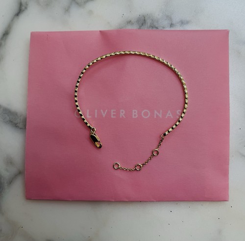 Gold tone twisted wave bangle - tone,