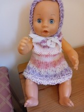 VINYL BABY DOLL WITH KNITTED OUTFIT