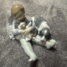 Lladro figurine boy with dog