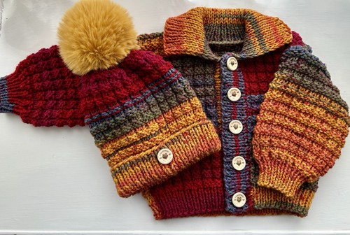 Hand knitted baby - hand,