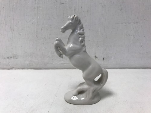 Porcelain rearing horse - rearing,