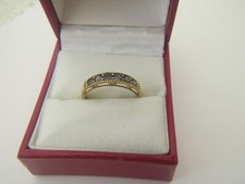GEMS 9 CARAT GOLD ALEXANDRITE HALF-ETERNITY RING SIZE R WITH CERTIFICATE