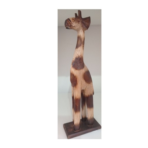 Wooden standing giraffe - on, a