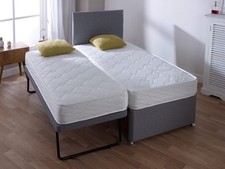 single guest bed with 2 mattress is available for sale