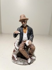 Old Man Sitting Down Giving