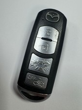 GENUINE MAZDA 4 BUTTON REMOTE SMART KEY 3 5 6 ETC TESTED. MITSUBISHI SKE13E-01