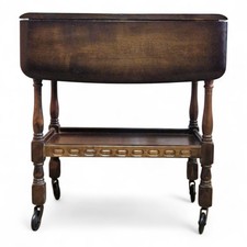 Vintage 2 tier carved oak folding occasional table / trolley with drawer