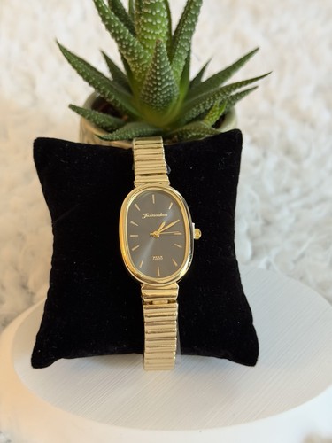 Gold tone grey dial watch - dial,