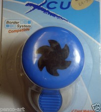 X cut Catherine wheel punch.  Can be used with the Xcut border punch system.