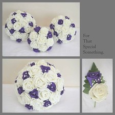 Brides bouquet with purple &