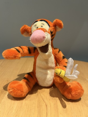 Tigger beanie holding - holding, a