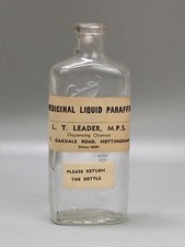 Vintage pharmacy bottle label Medicinal Liquid Paraffin L.T. Leader Nottingham