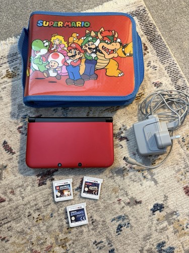 Red nintendo 3ds with - red,