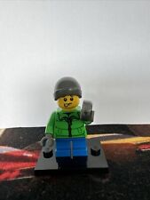 LEGO Boy in Green Jacket and Grey Hat with Coin (hol128)