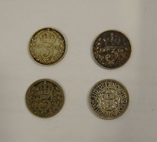 3 x George V silver 3 pence coins (1916/1918), 1 x George VI 3 pence coin (1940)