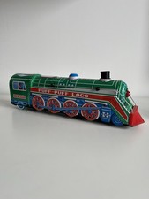 Vintage Tin Toy International