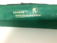 Vintage 1950's "HOHNER MELODICA" in green plastic carrying case. 