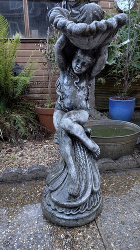 Garden angel and birdbath - and,